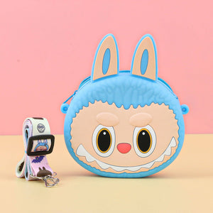 Cute blue Labubu Purse with bunny ears and face on a pink background
