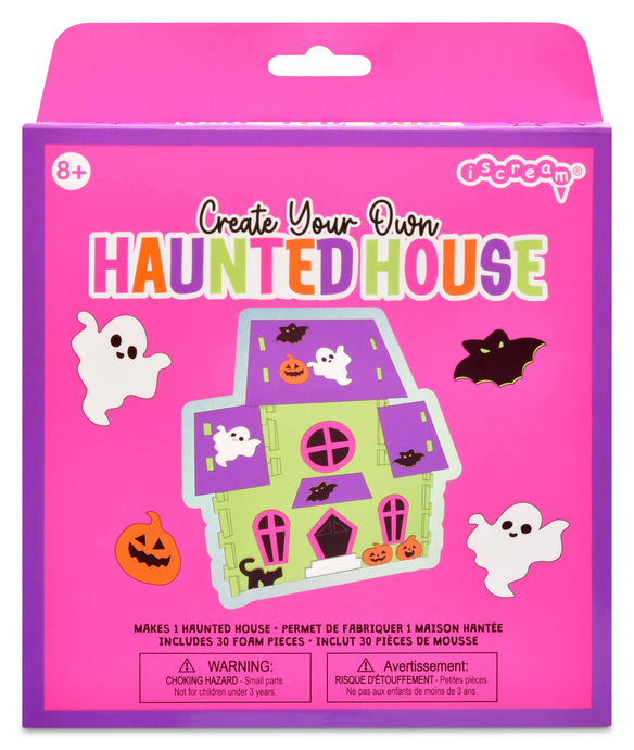 Packaging of 'Create Your Own Haunted House' craft kit with pink and purple design.