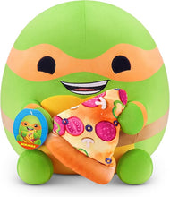 Load image into Gallery viewer, Snackles Ninja Turtles Michelangelo 14&quot; Plush by ZURU, Cuddly Squishy Comfort Plush with Teenage Mutant Ninja Turtles Theme and Pizza Snack Accessory
