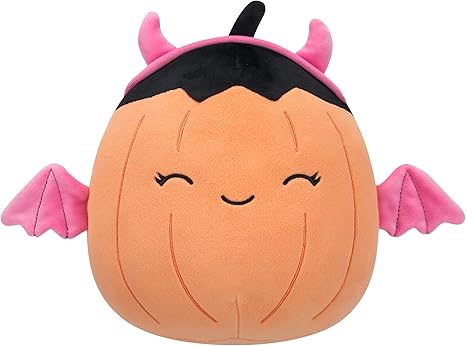Plush toy pumpkin with pink wings and horns on a white background